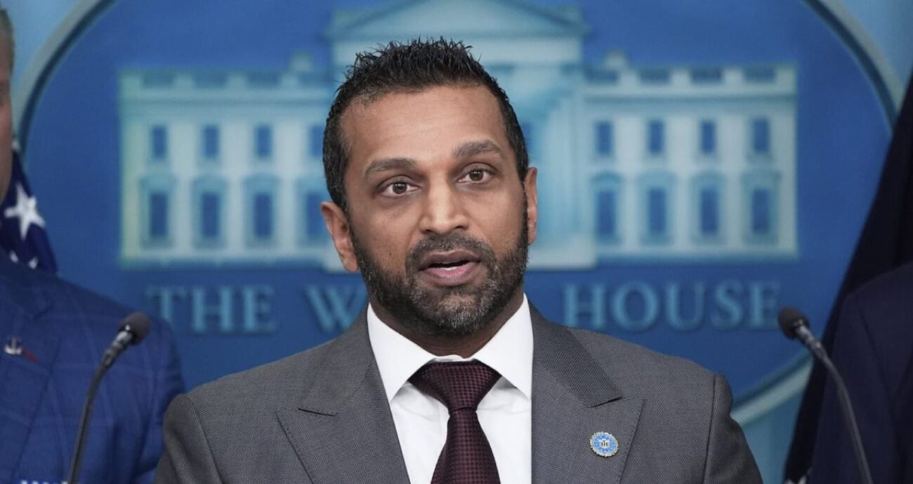 Man speaking at a podium in front of the White House logo
